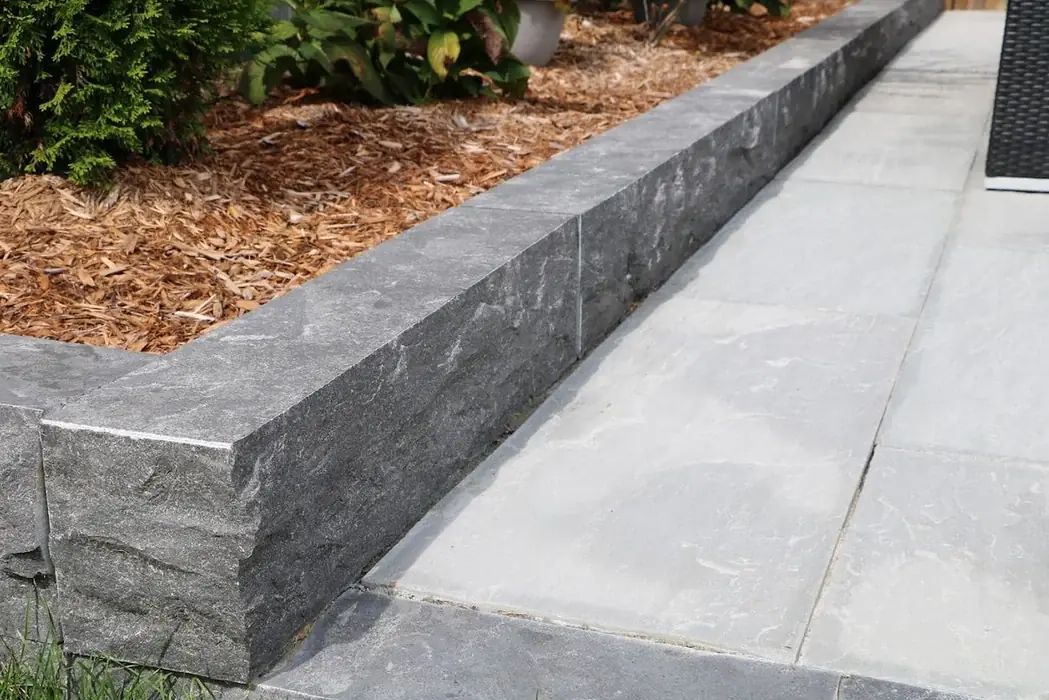 Stone patio with garden borders