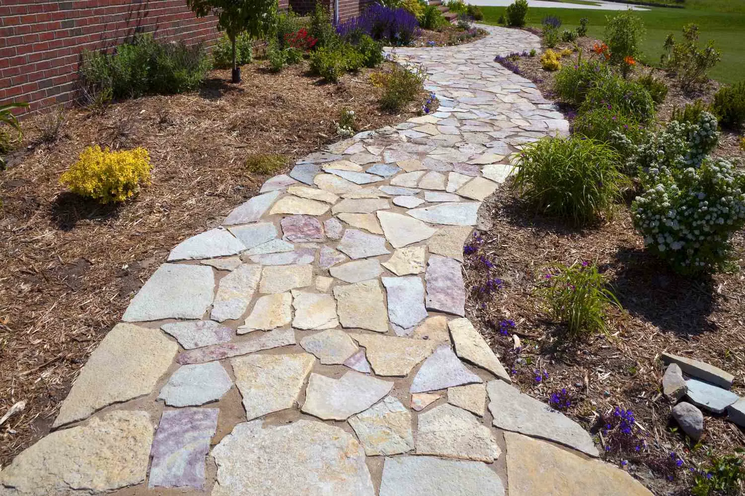 Natural stone walkway through gardens