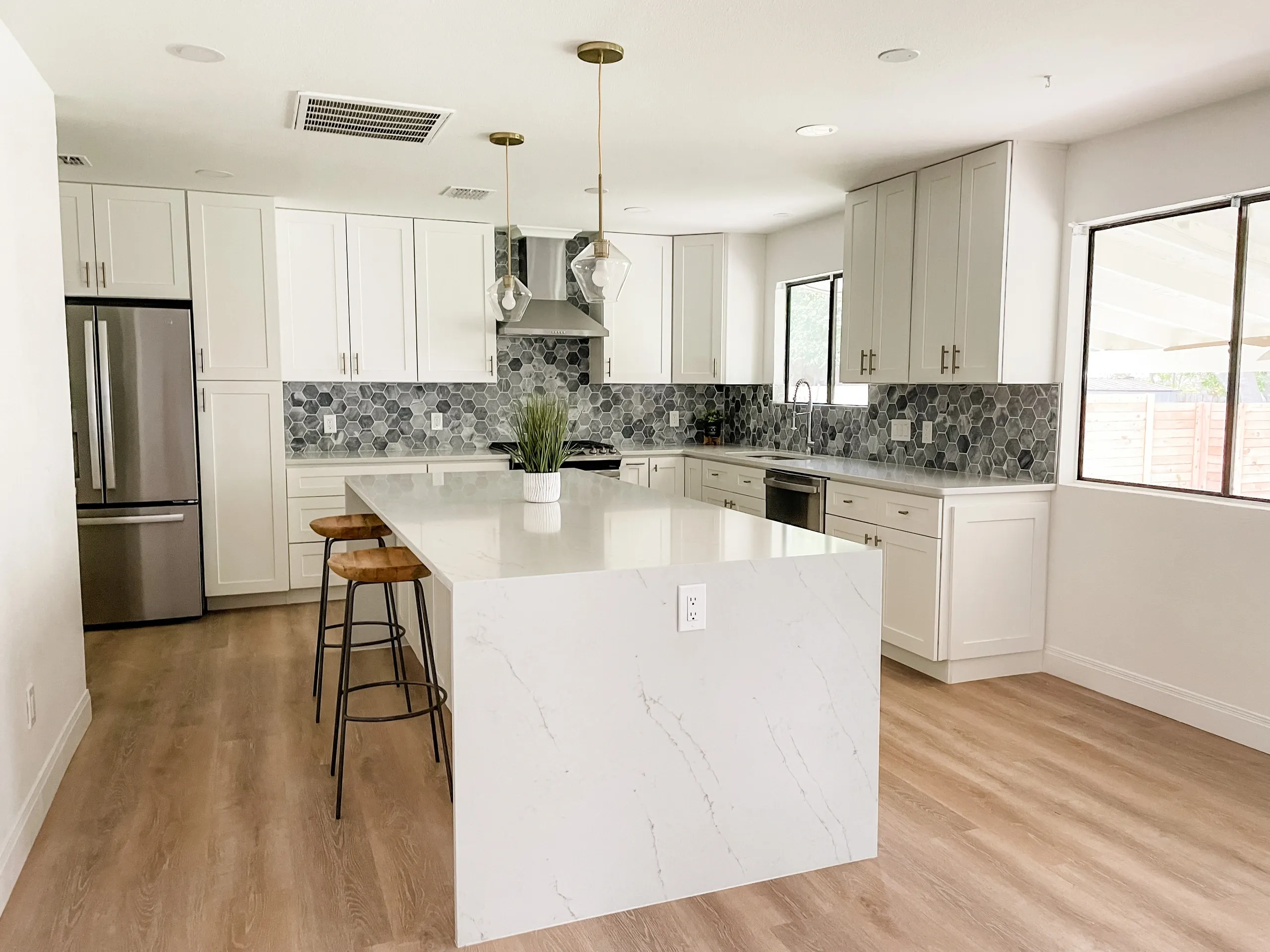 Shaker kitchen with subway tile backsplash